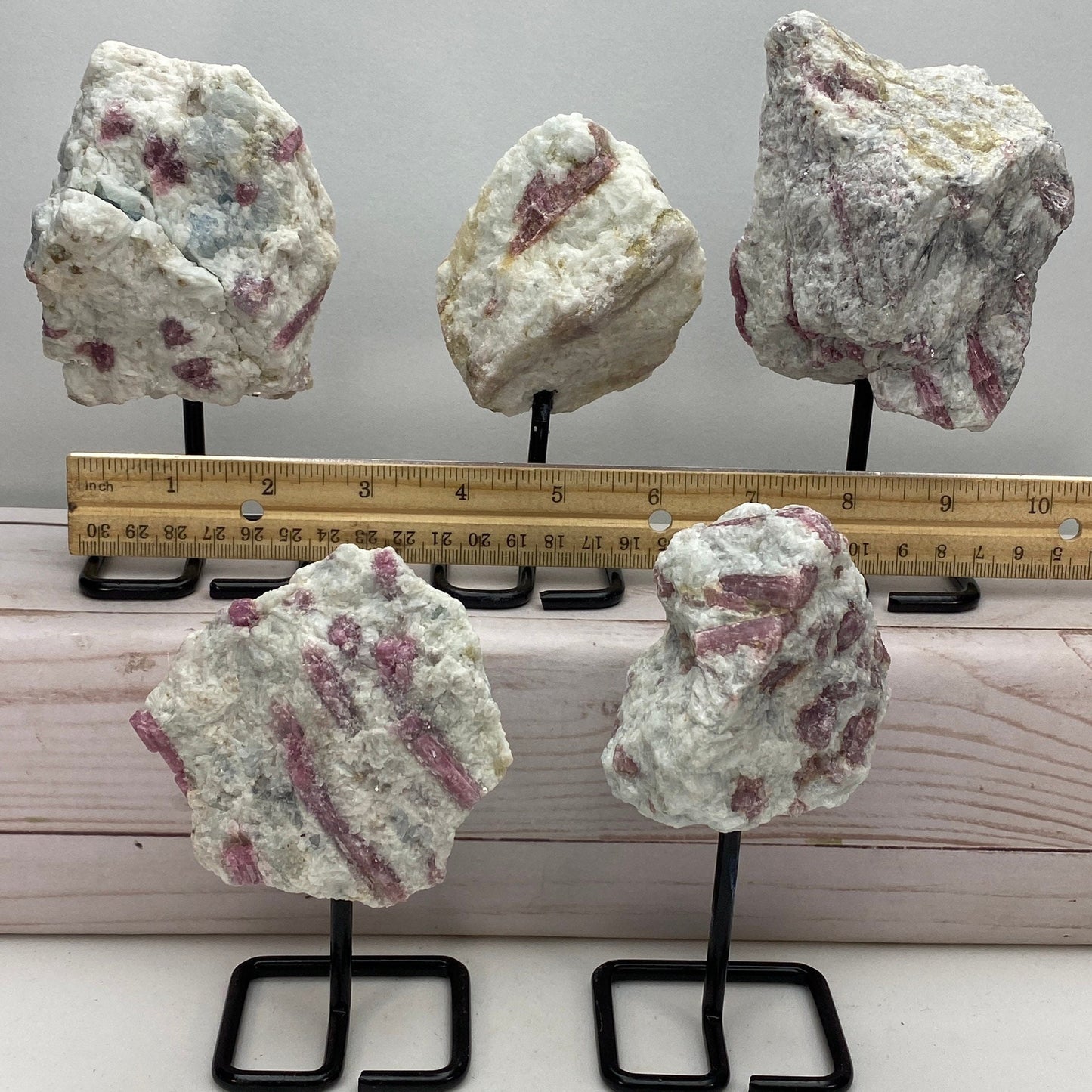 Roccia Roba - Pink tourmaline on a metal stand, rock decor