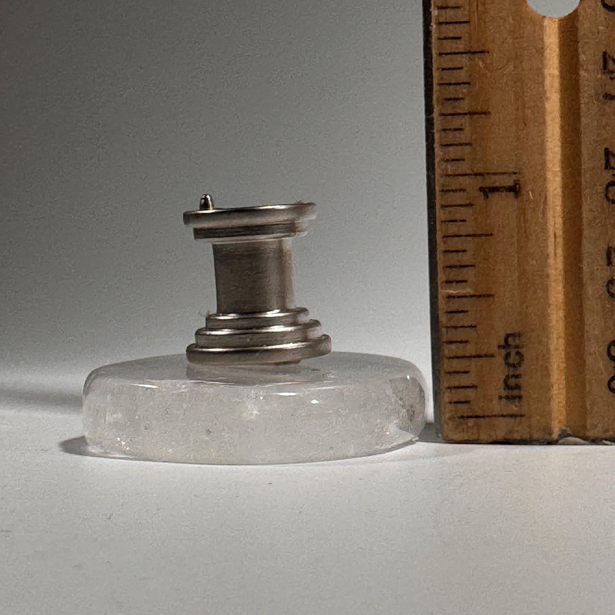 Polished clear quartz cabinet knob with chrome-like metal stem