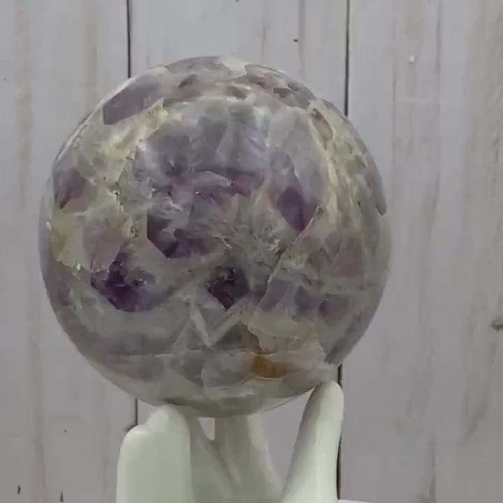 Amethyst sphere in acrylic stand