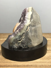 Amethyst geode with calcite on a wood base - RocciaRoba