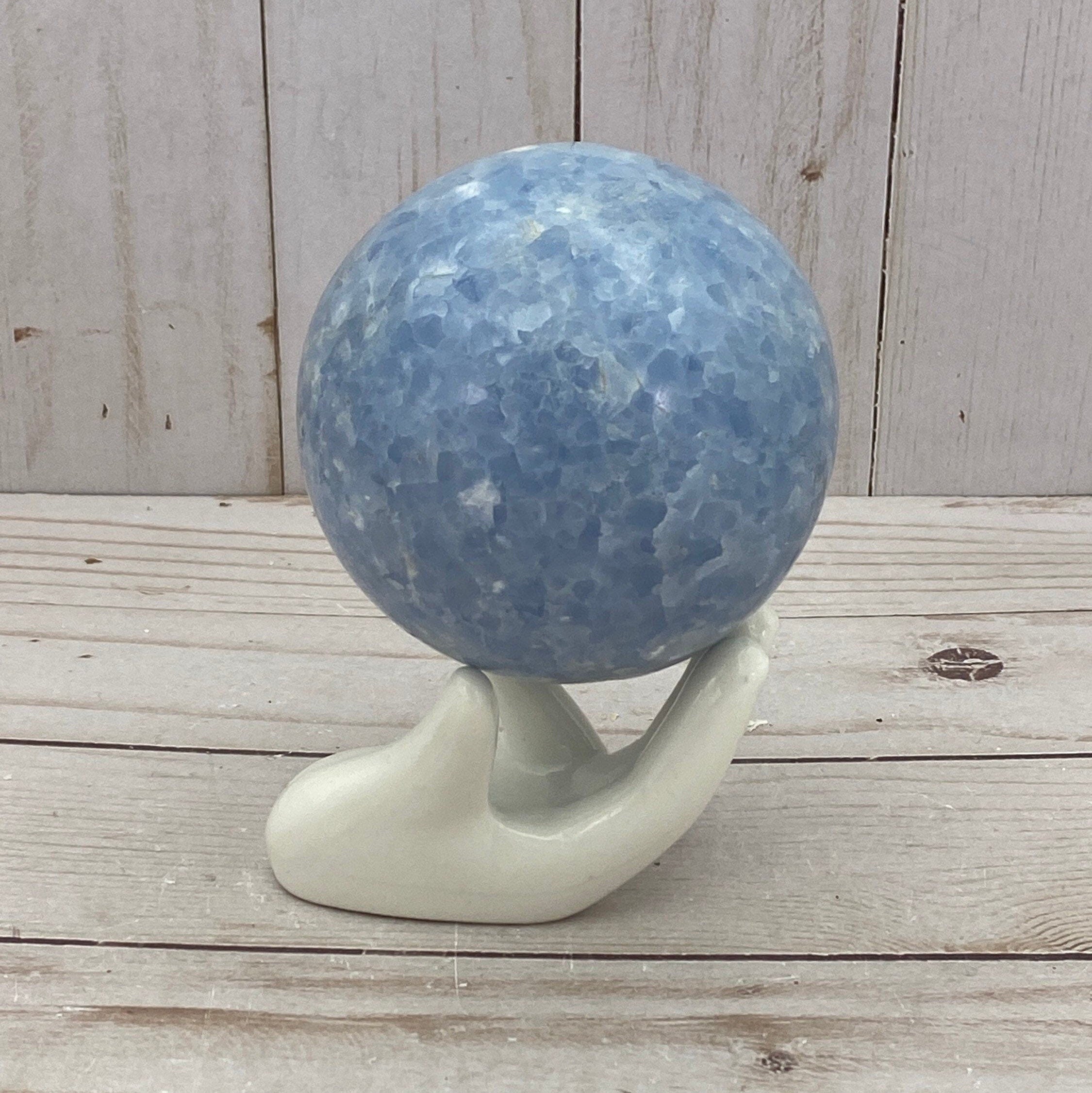Blue calcite sphere in stand