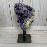 Dark purple amethyst cluster with stalactite eyes