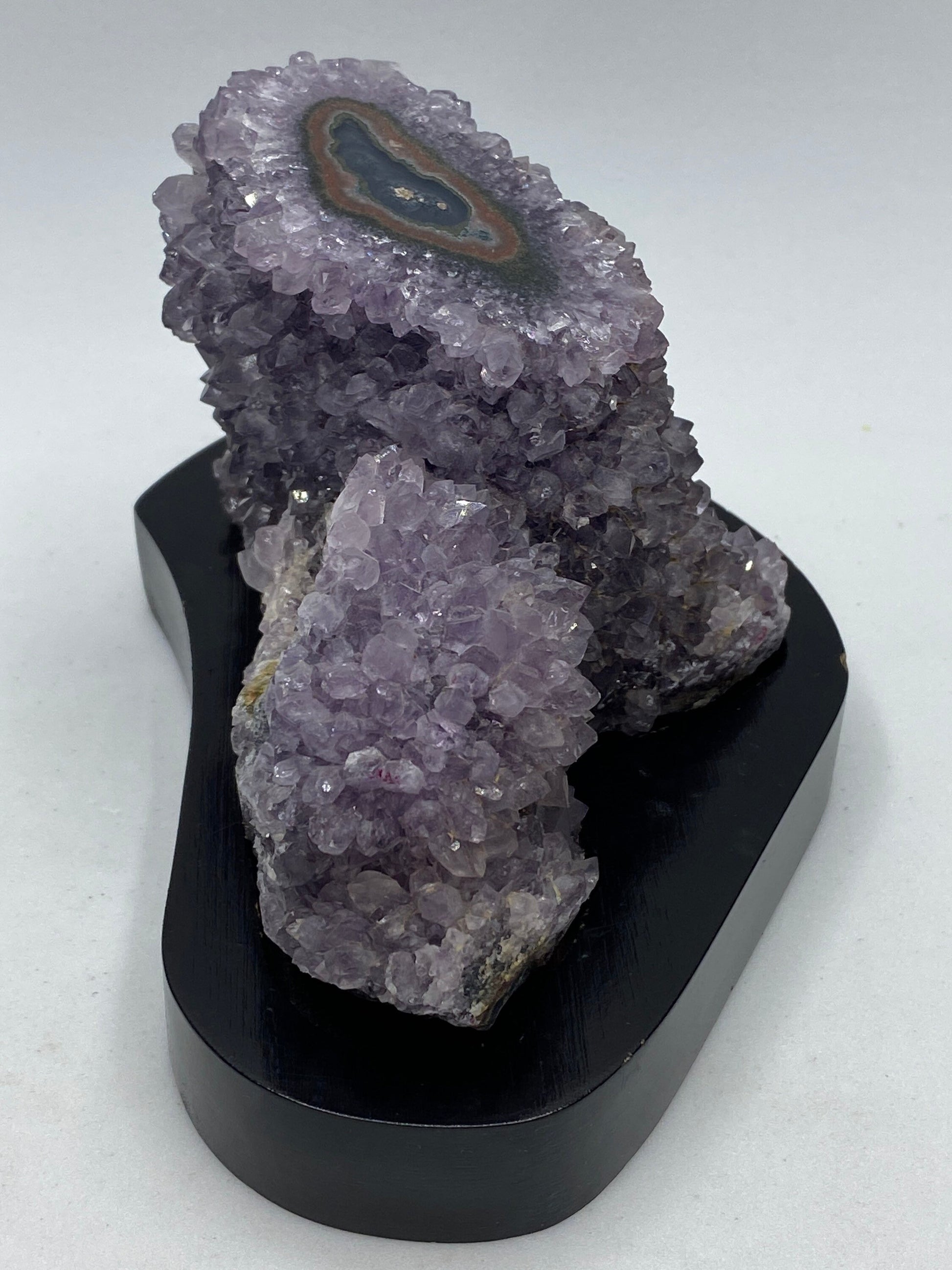 Roccia Roba - Amethyst geode stalagmite on a wood base, rock decor