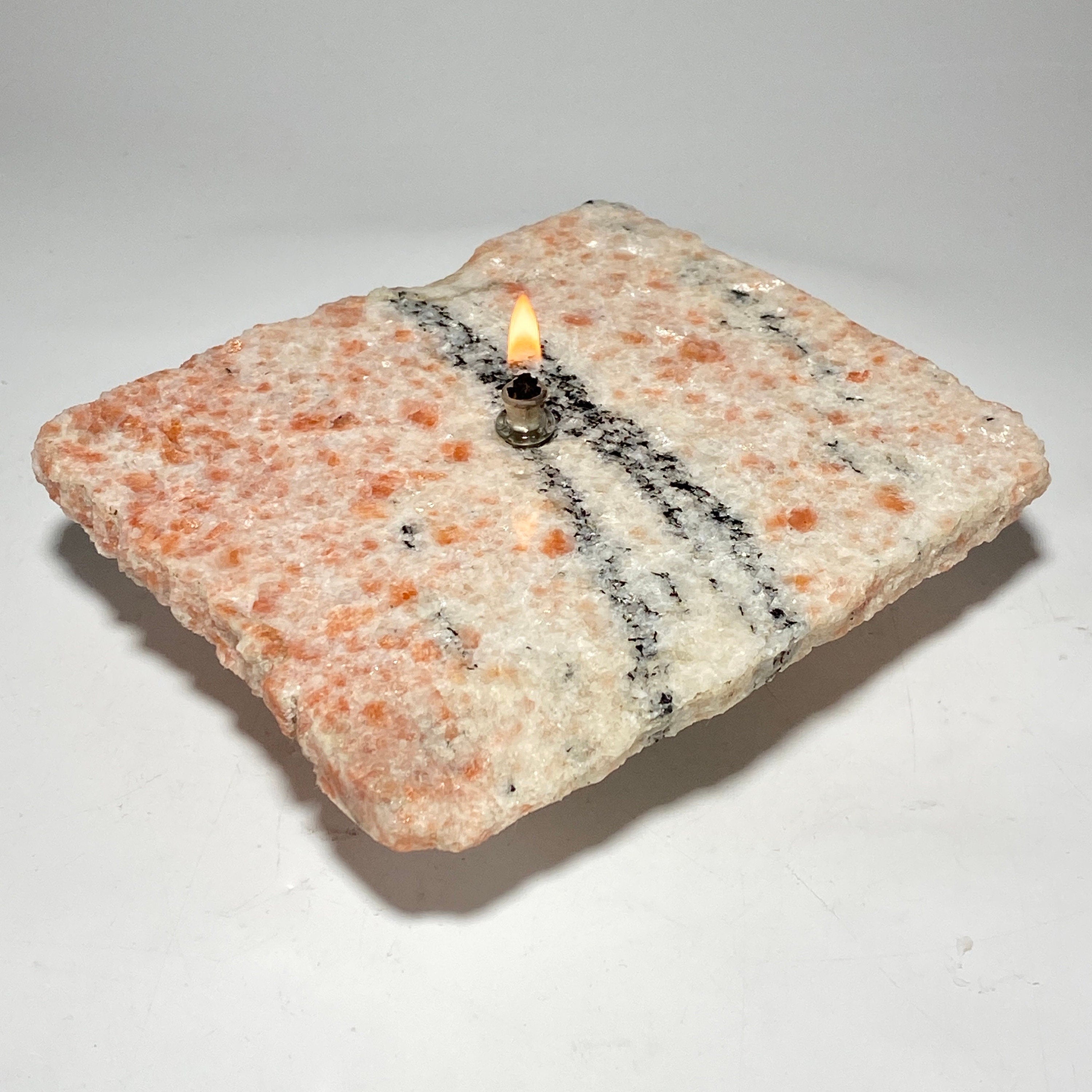 Sunstone rock candle