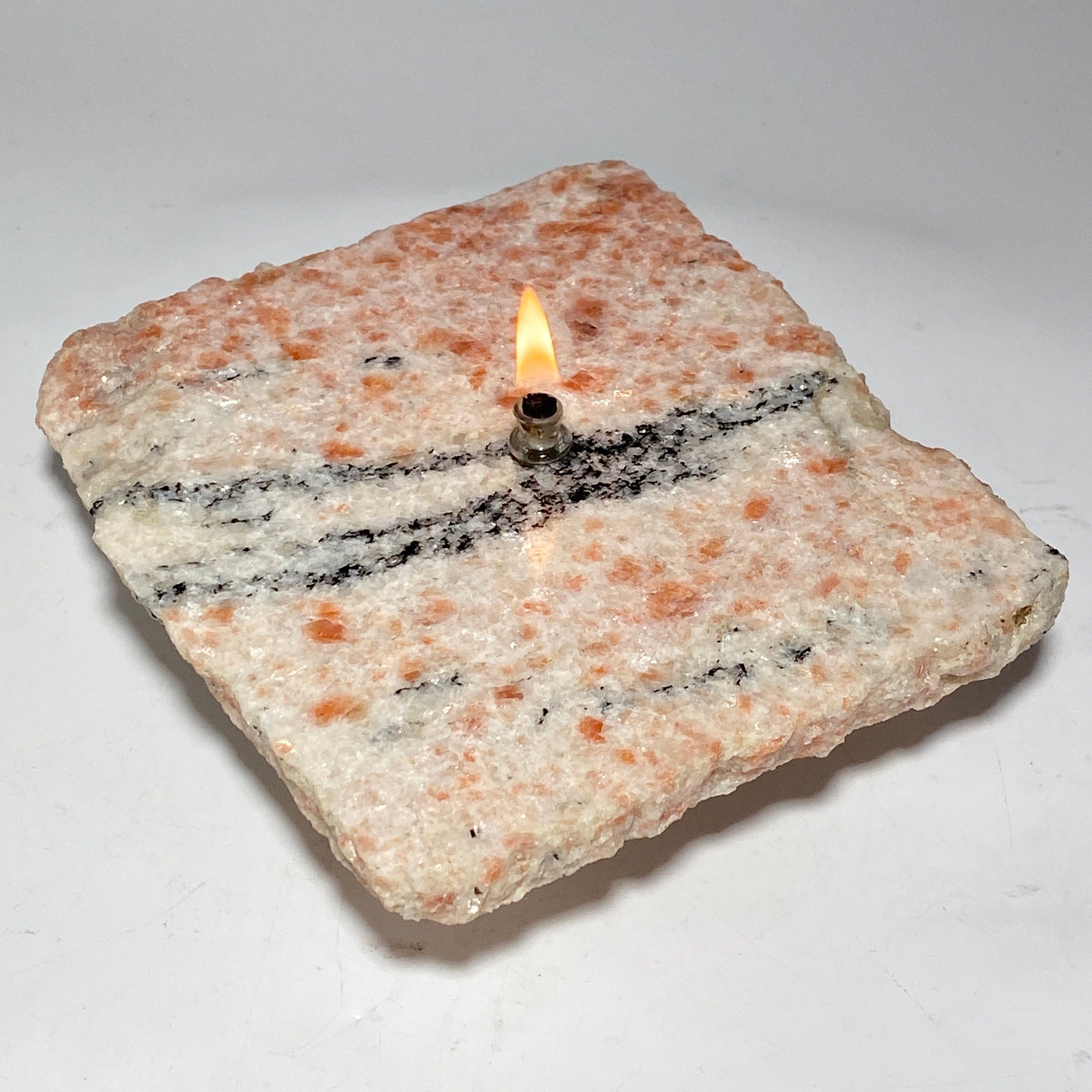 Sunstone rock candle