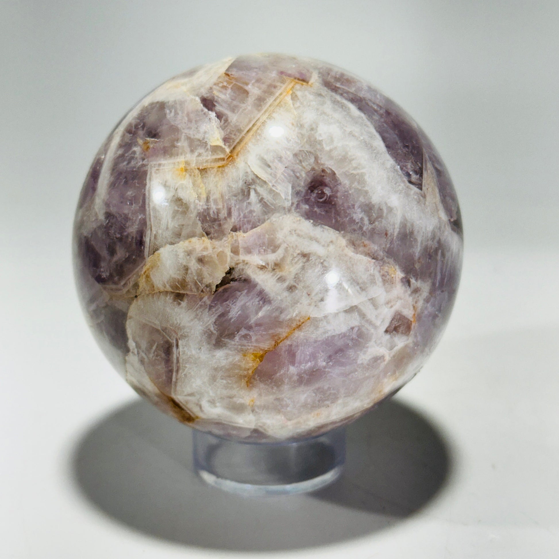 Amethyst sphere in acrylic stand
