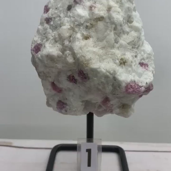 Raw Pink Tourmaline Specimen on Metal Stand