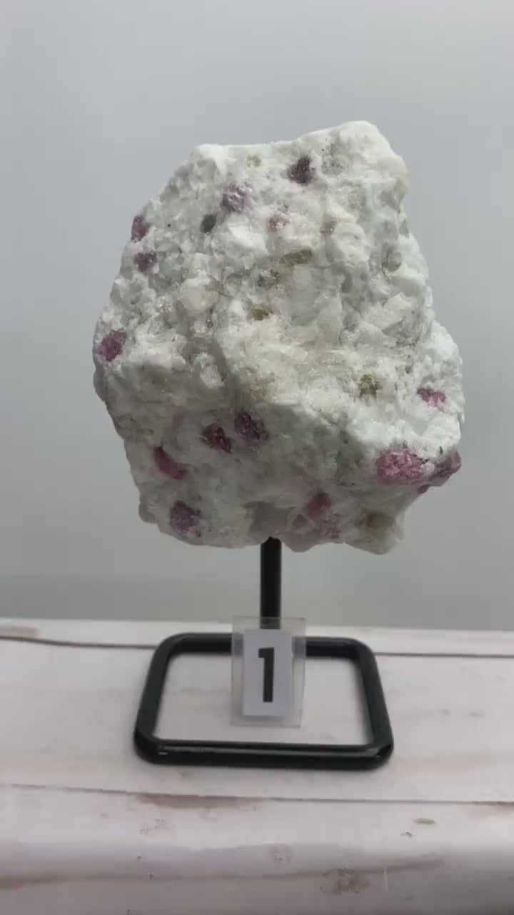 Raw Pink Tourmaline Specimen on Metal Stand
