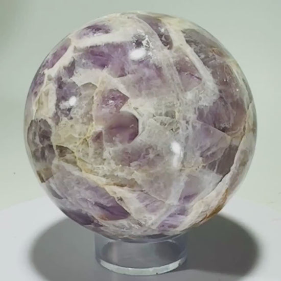 Amethyst sphere in acrylic stand
