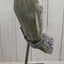 Amethyst geode cluster in metal stand