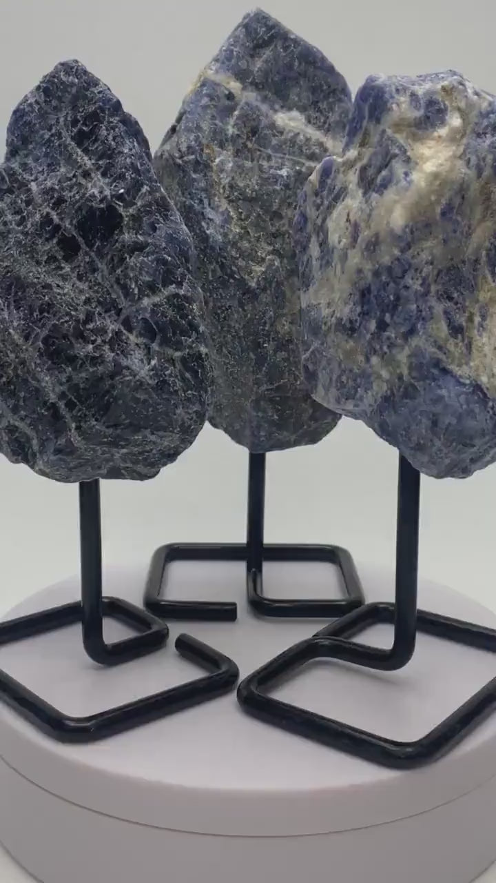 Standing rough sodalite mineral (250-400g) on a metal stand