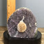 Amethyst geode with calcite on a wood base - RocciaRoba