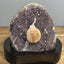 Amethyst geode with calcite on a wood base - RocciaRoba