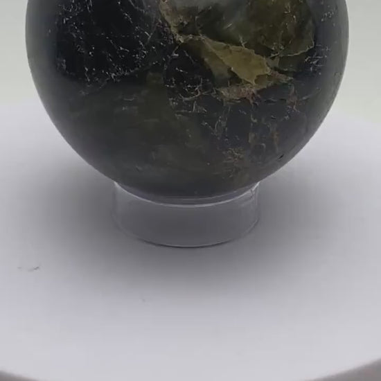 Labradorite sphere in acrylic stand