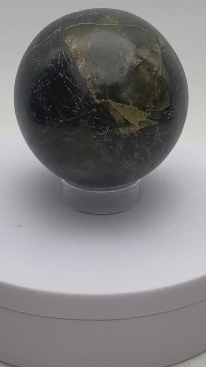 Labradorite sphere in acrylic stand