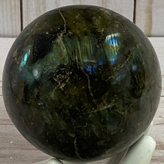 Labradorite sphere in acrylic stand