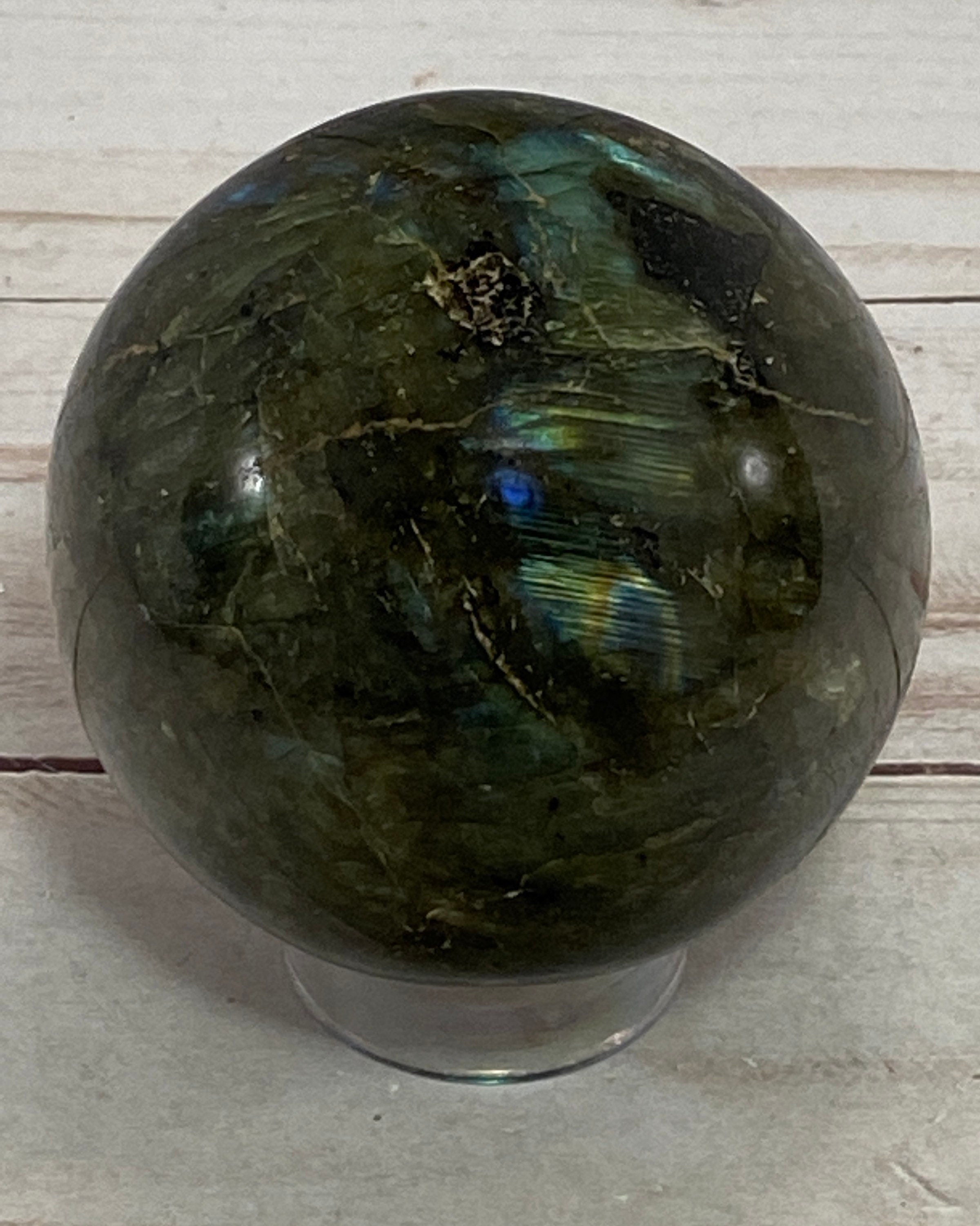 Labradorite sphere in acrylic stand