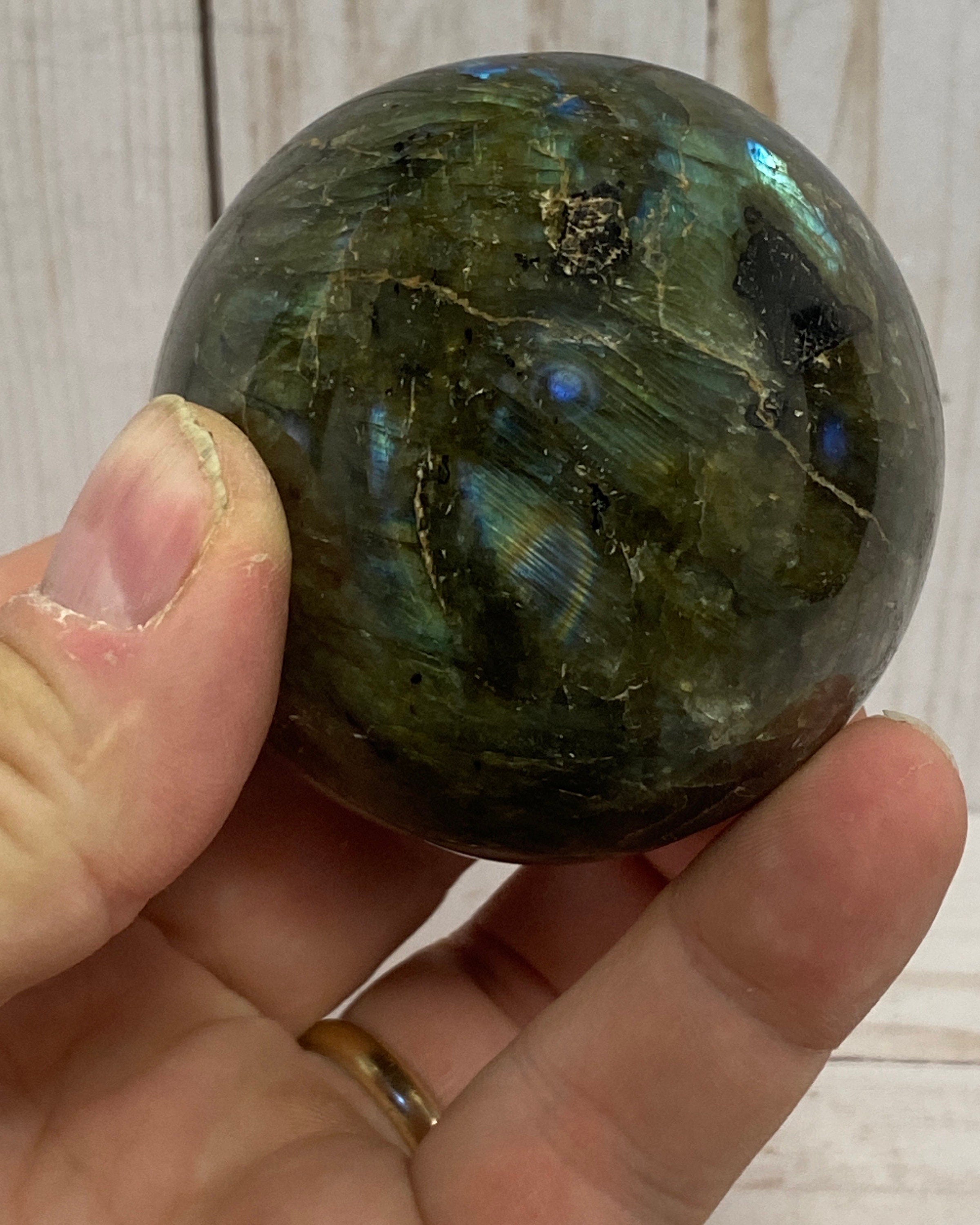 Labradorite sphere in acrylic stand