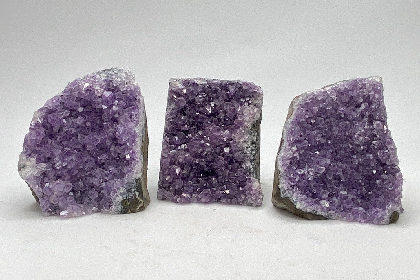 Amethyst cut base cluster 8-16 oz