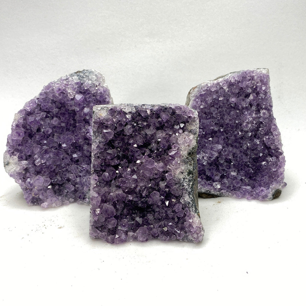 Amethyst cut base cluster 8-16 oz