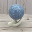 Blue calcite sphere in stand