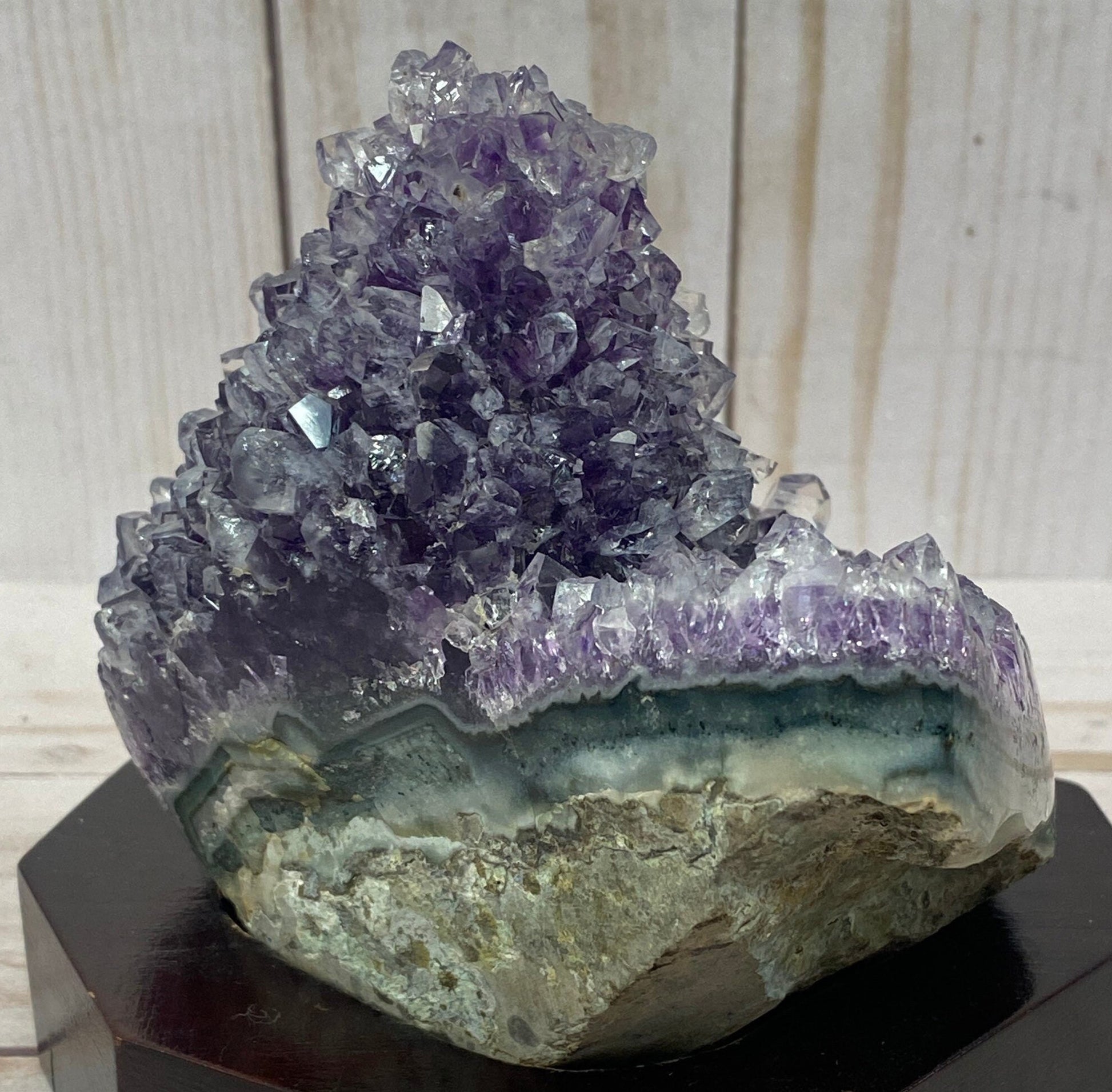 Amethyst Crystal Geode on a wood base