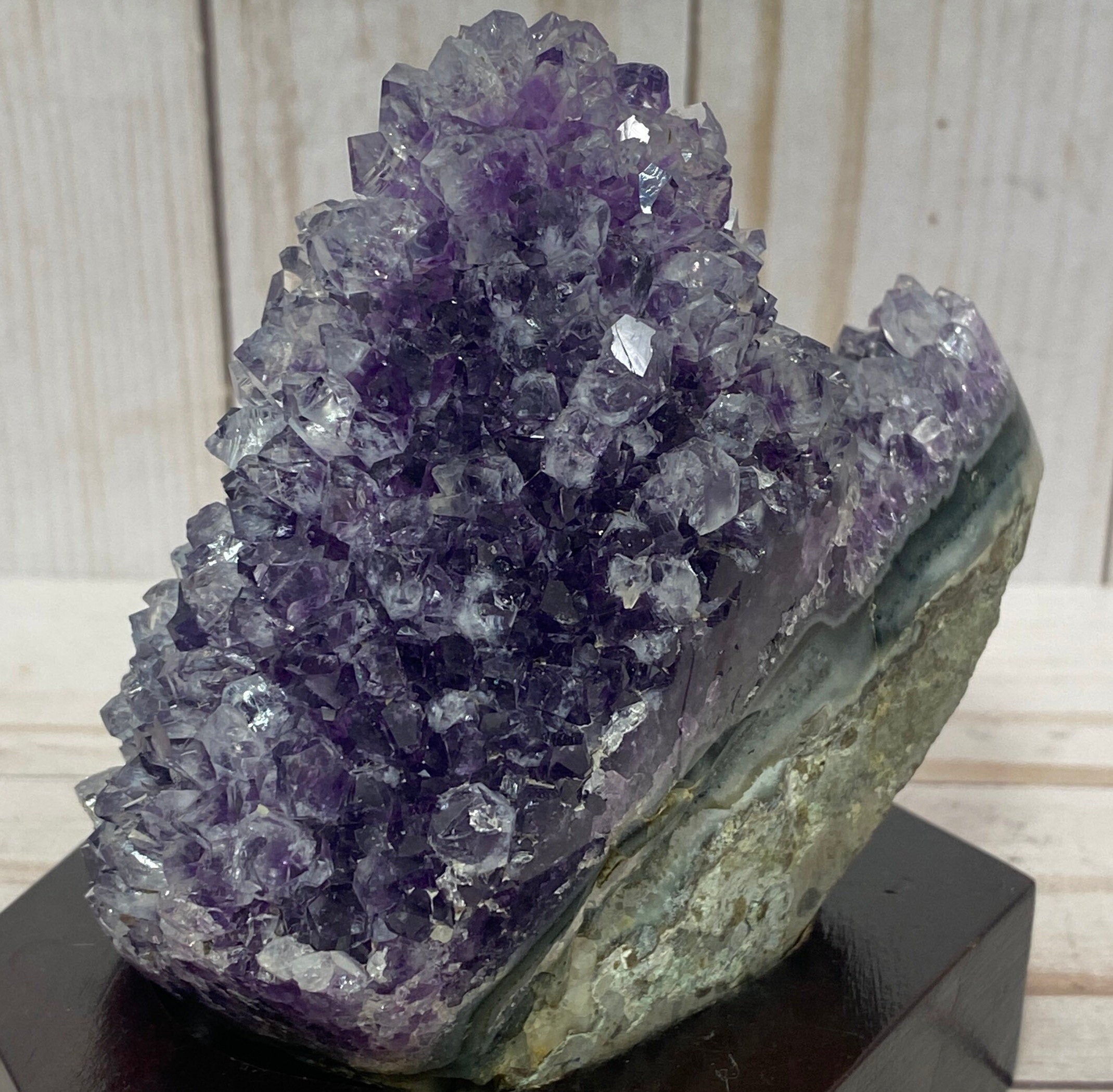 Amethyst Crystal Geode on a wood base