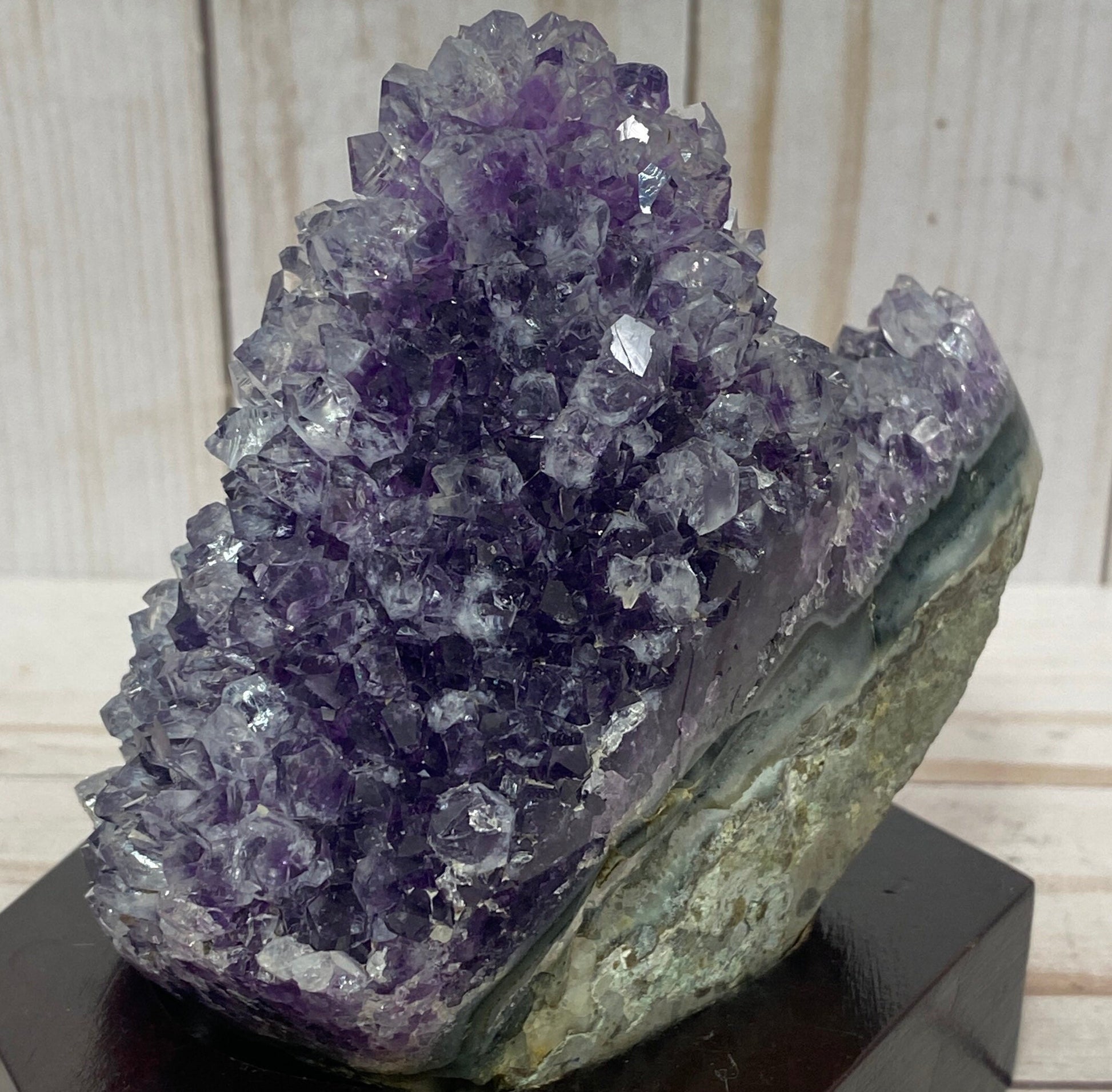 Amethyst Crystal Quartz Geode on a wood base