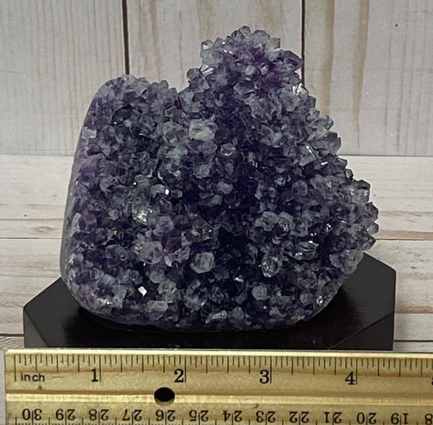 Amethyst Crystal Geode on a wood base