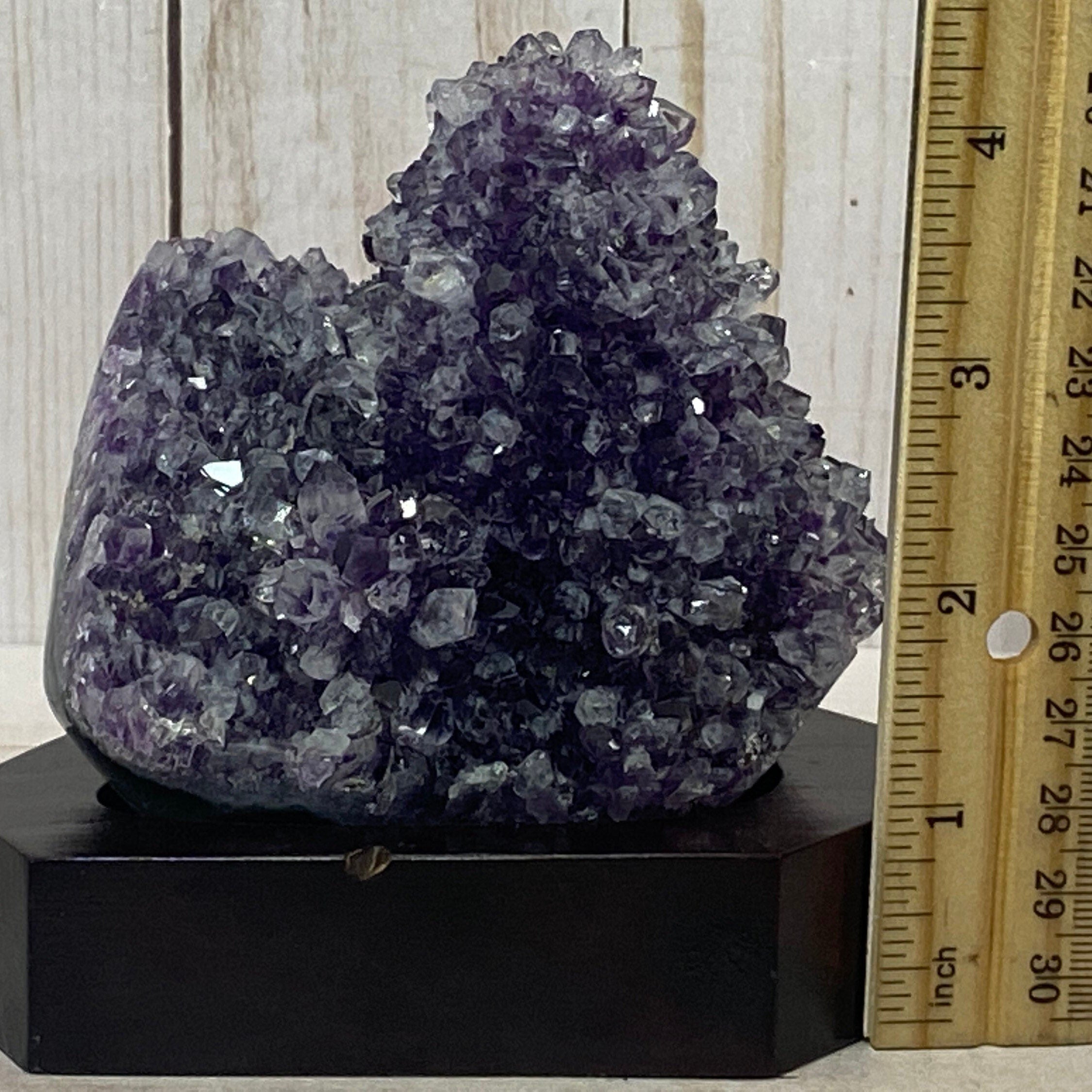 Amethyst Crystal Geode on a wood base