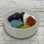 Chakra stones in a Selenite charging bowl