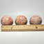 Sunstone sphere in acrylic stand