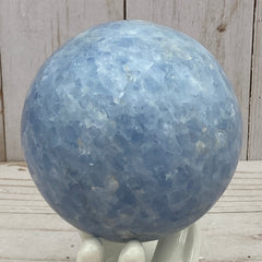 Blue calcite sphere in stand